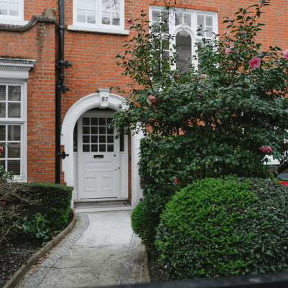 A house with a white door, representing Lendhub's bridging loan product.